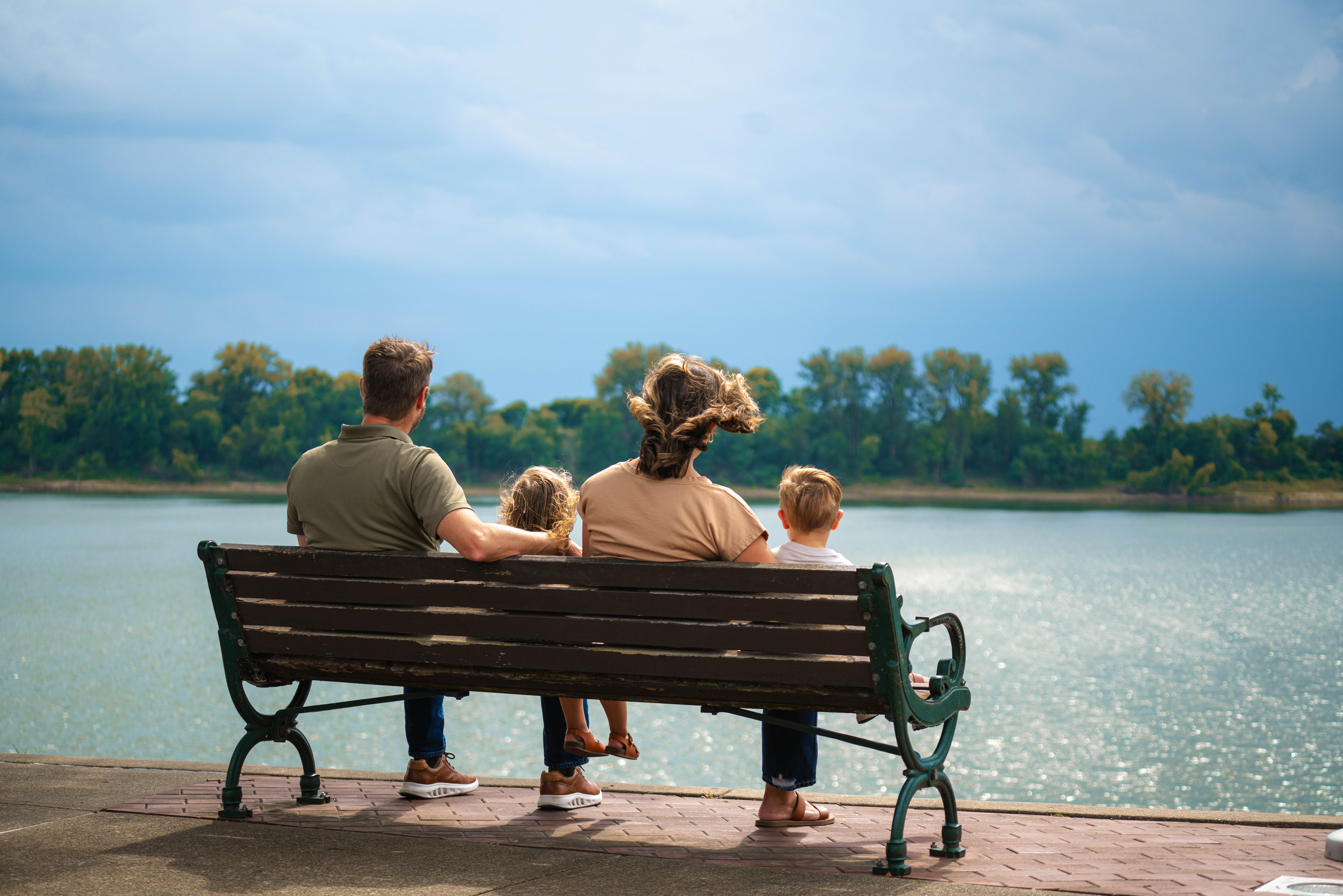 Family on riverfront, nice summer day