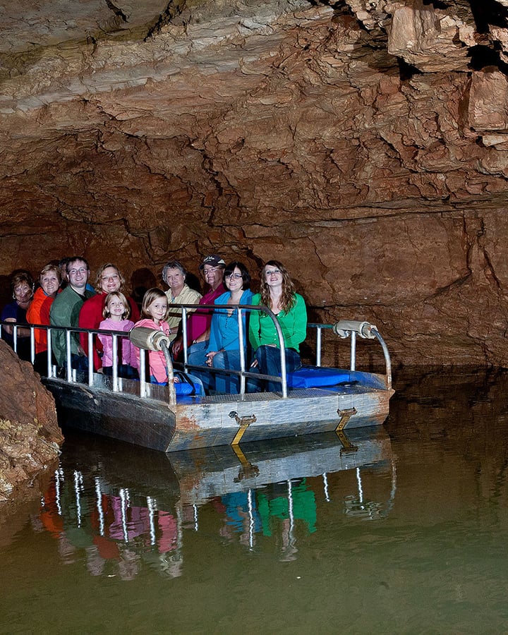 A group on a cave boat ride at Indiana Caverns