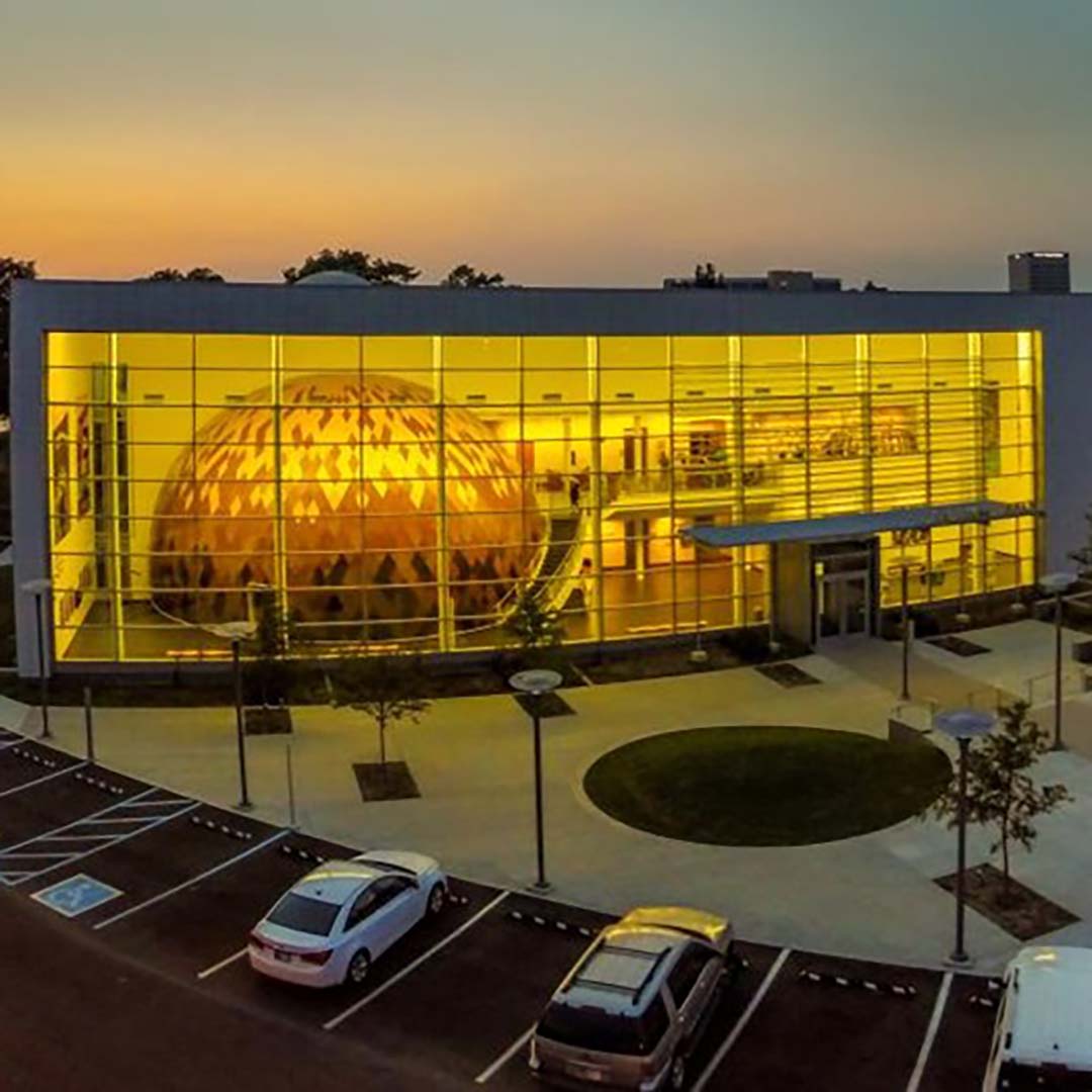 An exterior shot at dusk of the Evansville Museum of Arts, History, and Science