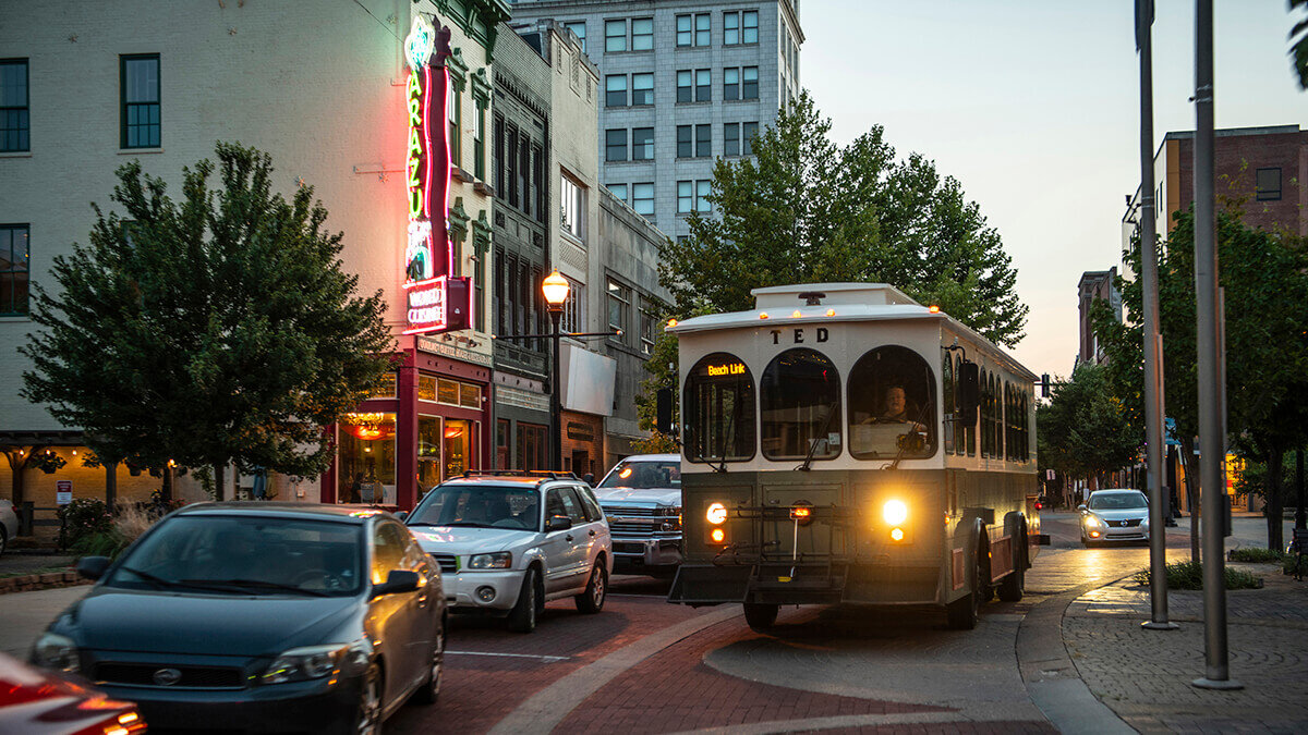A TED trolley on a brick street in downtown Evansville