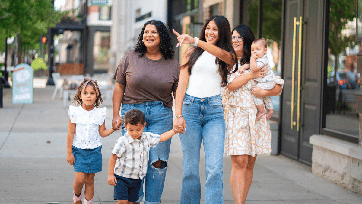 family walking in downtown evansville